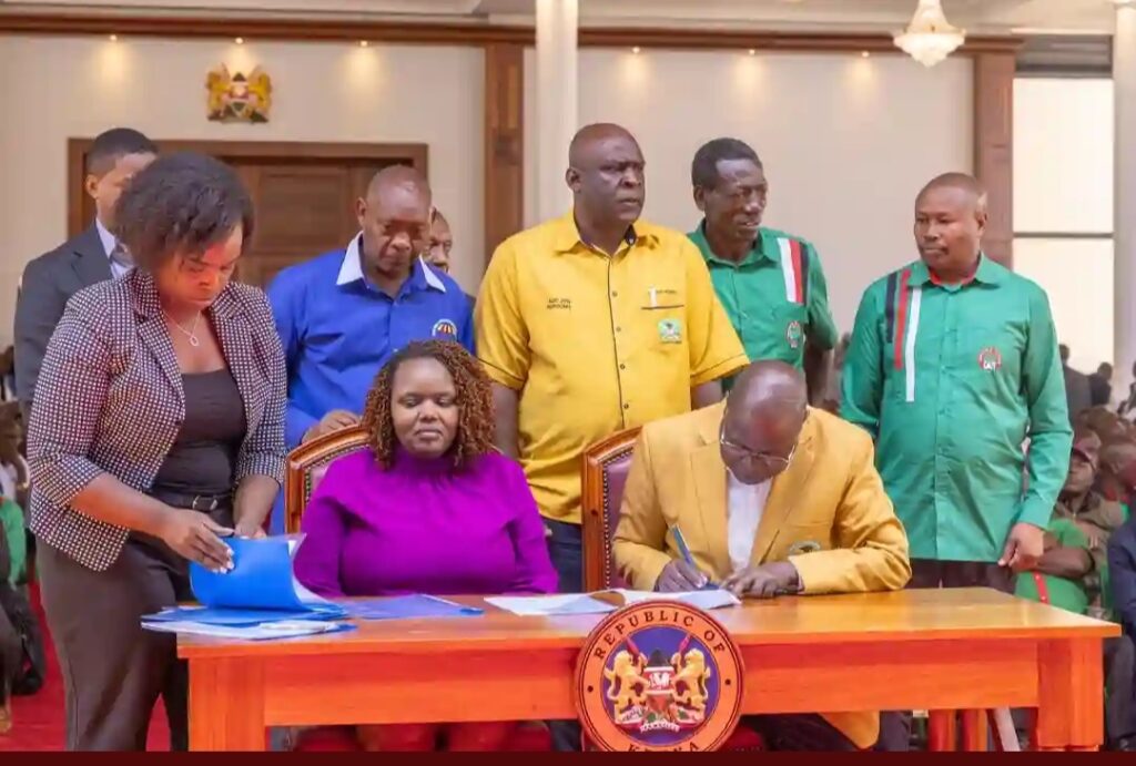 KUPPET SG Akello Misori and Affordable Housing officials formalize the 20% housing scheme agreement at State House. (Photo: State House Kenya)