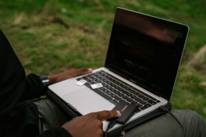 A student utilizing a laptop for independent study.